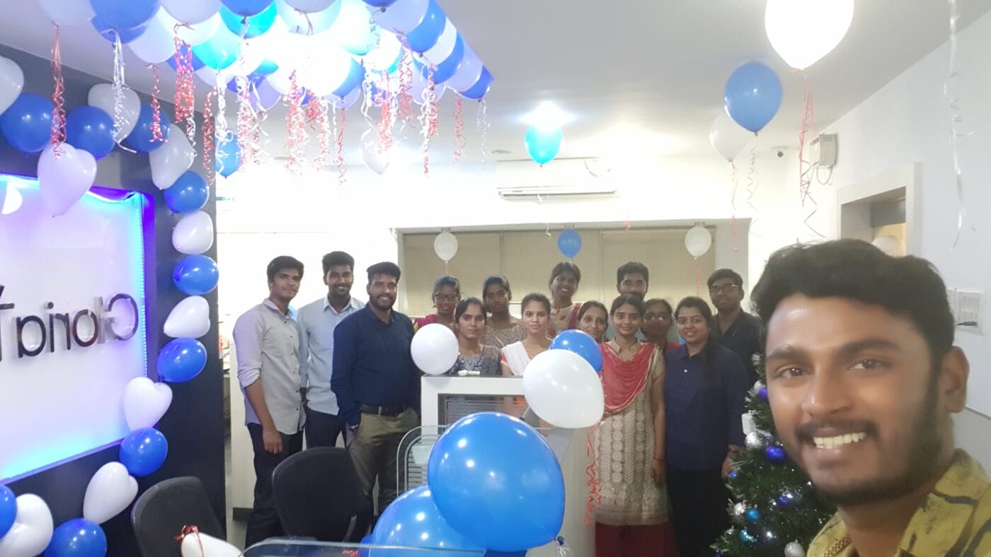 The team celebrating Christmas in the office